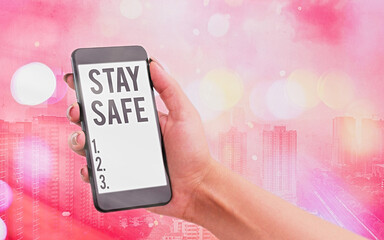 Handwriting text Stay Safe. Conceptual photo secure from threat of danger, harm or place to keep...
