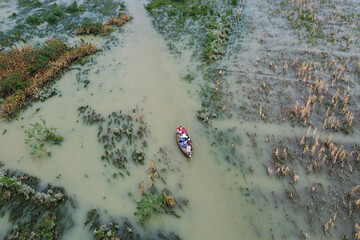 Aerial view farmlands in flood water.