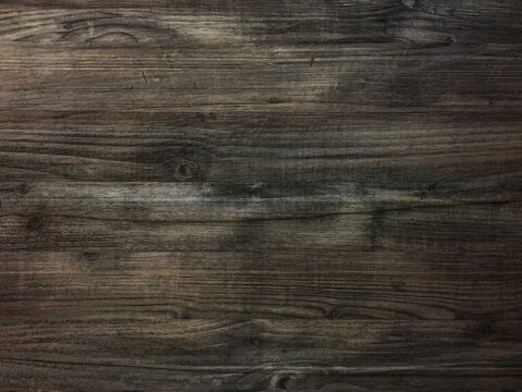 wood brown background, dark wooden abstract texture.