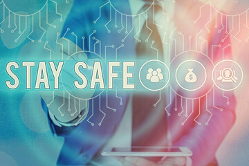Word writing text Stay Safe. Business photo showcasing secure from threat of danger, harm or place...
