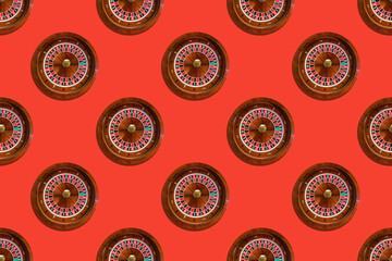 Seamless pattern of game table roulette from elite casino on red background