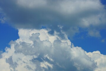gray white clouds on blue sky on a sunny day