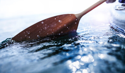 Kayak paddle in water