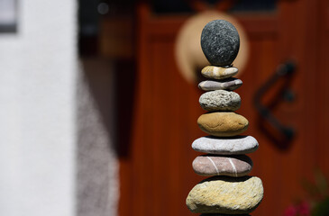 Still life with stones stacked on a doorstep