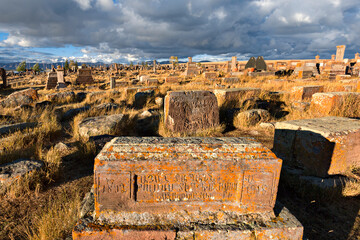 Historical tombs and head stones known as Khachkars or Armenian cross stones, in the ruins of the...
