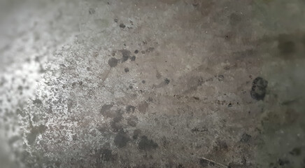 Przemysłowa szara posadzka w zbliżeniu.