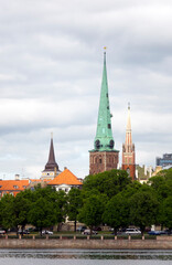 Riga, Latvia. View of historic buildings across the Daugava River..