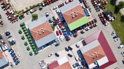 Aerial view of brand new and second hand car dealers site