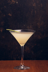 Fruit Martini on rustic background with space for text. Vertical shot.