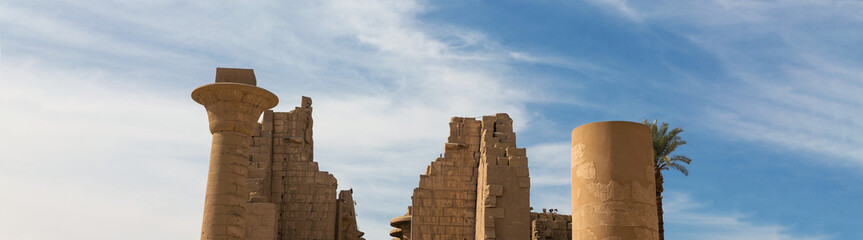 Karnak Temple, Colossal sculptures of ancient Egypt in the Nile Valley in Luxor, Embossed hieroglyphs on the wall