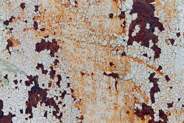Cracked white painted weathered rusty background.