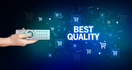 hand holding wireless peripheral with BEST QUALITY inscription, online shopping concept