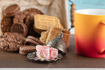 Cocoa and unsalted butter cookies with a cup of drink