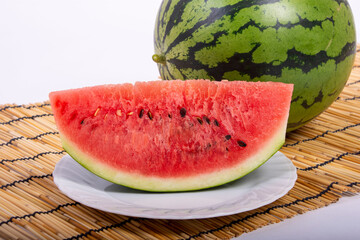 夏の代表的な食材のスイカを花からつぼみやカットした写真を撮影、素材背景にどうぞ
