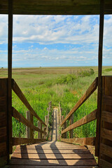 The interior of a wooden wildlife observation tower in the wetlands of Isola Della Cona in Friuli-Venezia Giulia, north east Italy
