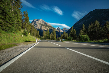 Naklejka premium Asphalt road and beautiful weather in Tyrol.2020.Hahntennjoch
