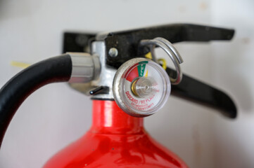 Wall mounted fire extinguisher in residential garage 