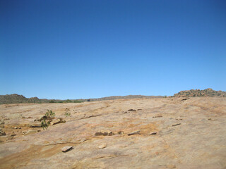desert landscape with blue sky and clouds