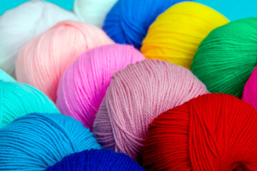 Bright multi-colored acrylic yarn. Colorful background.