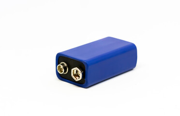 a blue 9 volt battery isolated on a white background