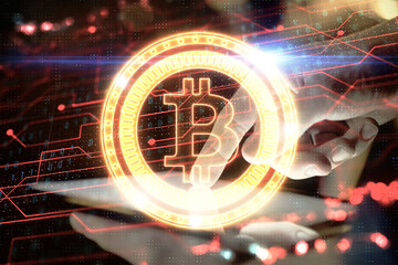 Double exposure of man's hands holding and using a phone and crypto currency blockchain theme...