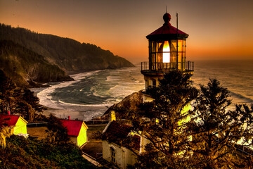 Heceta Head lighthouse at sunset on the southern Oregon coast near Florence.