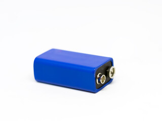 a blue 9 volt battery isolated on a white background