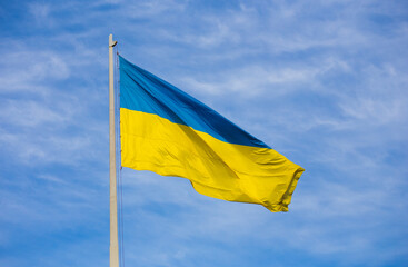 National flag of independent Ukraine waving in the wind
