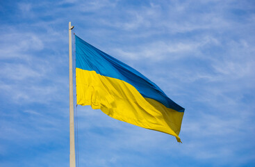 National flag of independent Ukraine waving in the wind