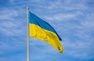 National flag of independent Ukraine waving in the wind