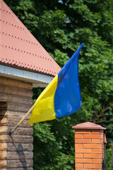 National flag of independent Ukraine waving in the wind