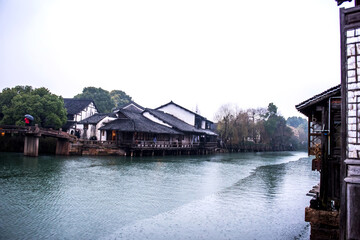 Fototapeta na wymiar Wuzhen,Tongxiang city,Zhejiang province,Chine. The night view of ancient town,Wuzhen, is a famous historical,cultural and traditional water town.