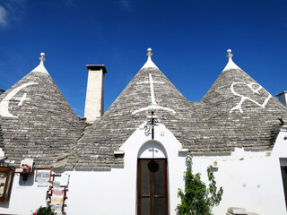 Fototapeta na wymiar The roofs of Alberobello's historical houses 