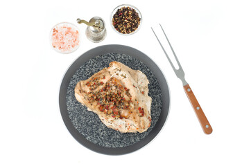 Meat dishes, grilled turkey with seasonings and spices.