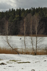 Rybak na lodzie. Polska - Mazury - Warmia. © Rafa