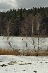 Wędkarz. Zima. Krajobraz. Polska - Mazury - Warmia. © Rafa