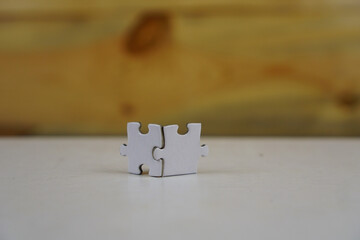 Incomplete Jigsaw puzzle pieces background concept copy space
