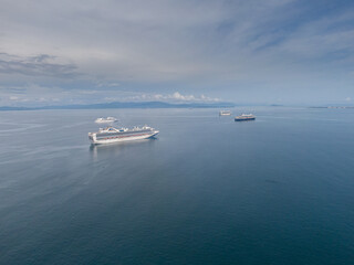 Beautiful aerial view of a lot of Cruise Ships on the middle of the ocean