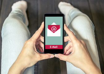 A woman is shopping at the online store. Shopping cart icon. Ecommerce.