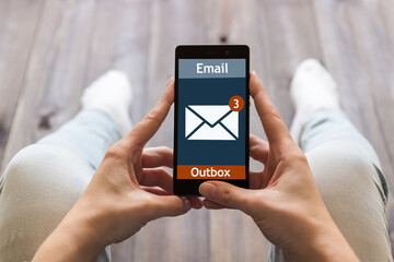 A woman is shopping at the online store. Shopping cart icon. Ecommerce.