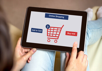 A woman is shopping at the online store. Shopping cart icon. Ecommerce.