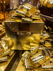 beautiful golden festive boxes with gifts