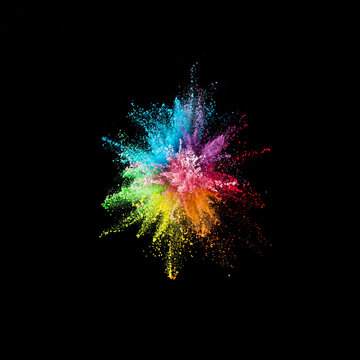multi-color powder  explosion on black background.