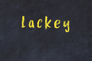 College chalk desk with the word lackey written on in - obrazy, fototapety, plakaty