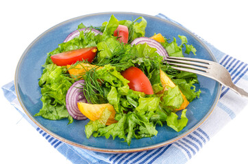 Vegetable dishes, fitness menu. Blue plate with salad on white background.