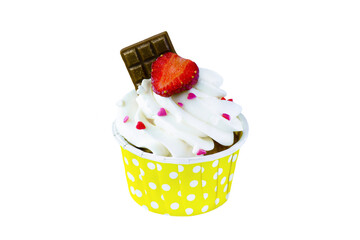 Isolated cupcake in yellow pack with cream-cheese, strawberry, gold chocolate and small candy hearts