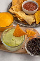 Chips and snacks with dip and dressing, rest and snacks close-up