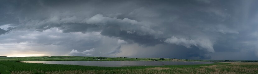 Fototapeta na wymiar Severe Weather in Summertime on the Great Plains With Bodies of Water in the Photo