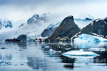Fototapeta na wymiar Snowing Argentine Station Blue Glacier Mountain Paradise Harbor Antarctica