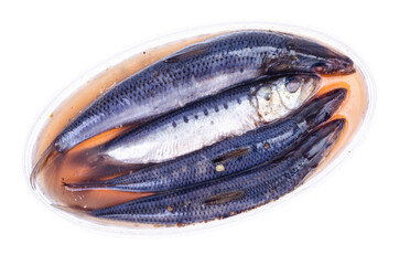 Pickled salted fish, herring in plastic. Photo